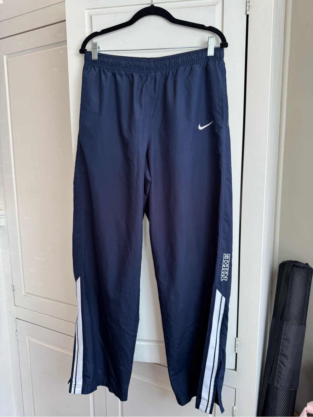 Nike Navy Track Pants with White Stripe Accents